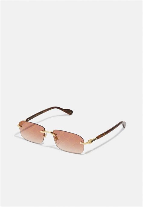 occhiali da sole GUCCI GG 1103 sunglasses oval brown red 